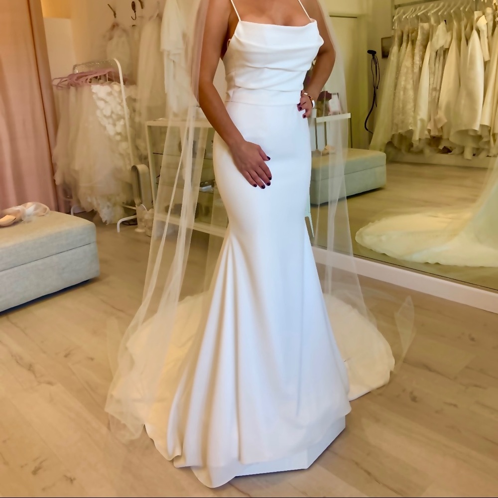 Mikaella wedding dress, beans new, never worn. AUS 4. Never altered.